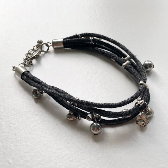 Jewelry - Multi-layered black and silver charm bracelet